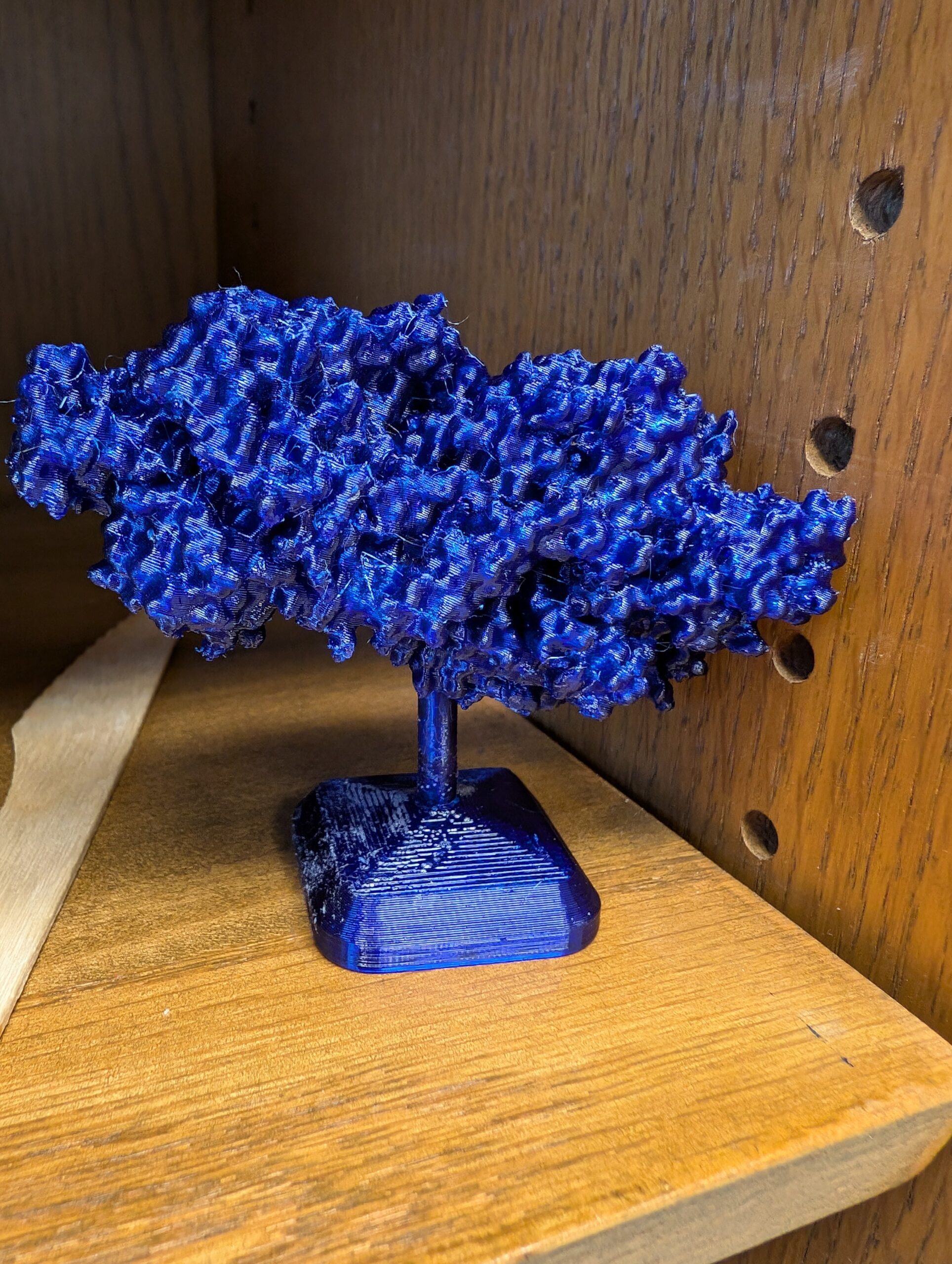3D printed version of a molecule on a stand
